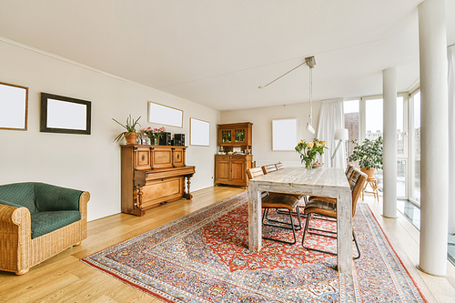 Lovely expansive dining area with large table and large full-length windows