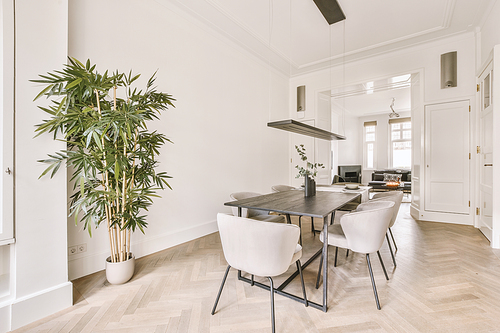 Interior of the dining area with modern furniture in a cozy house