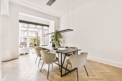 Interior of the dining area with modern furniture in a cozy house