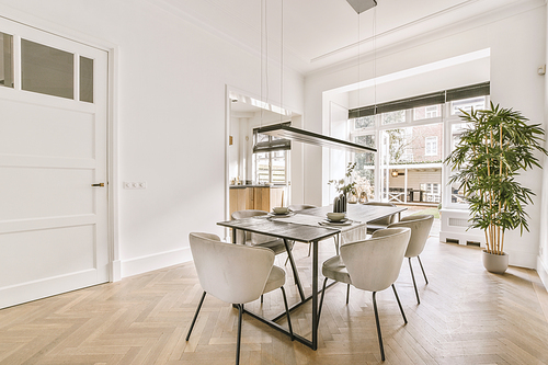 Interior of the dining area with modern furniture in a cozy house