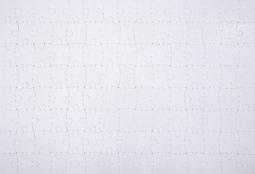 White jigsaw puzzle pattern background. jigsaw puzzle