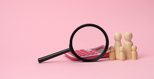 wooden figurines of little men family, magnifier and calculator on a pink background. Family budget planning concept, investment, savings. Receiving a subsidy