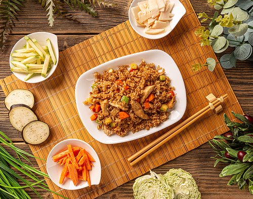 Chinese style menu, stir fry vegetables with chicken breast and boiled rice