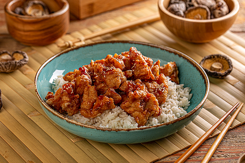 Homemade sesame chicken served with Jasmine white rice