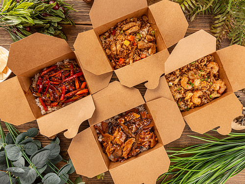 Various Chinese food in take-out box, flat lay, top view