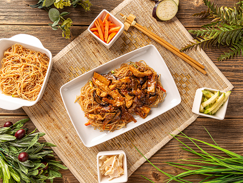 Chinese noodles with chicken and pices of bamboo shoots