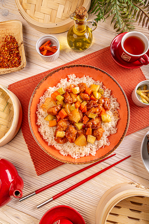 Fried chicken with pineapple in sweet and sour sauce served with rice