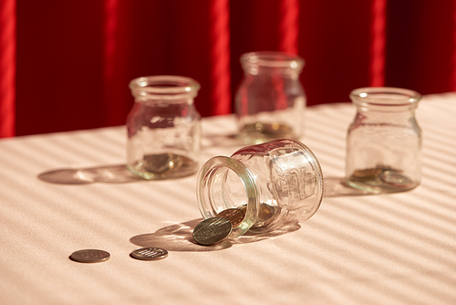 Coins in glass jar. Money savings concept