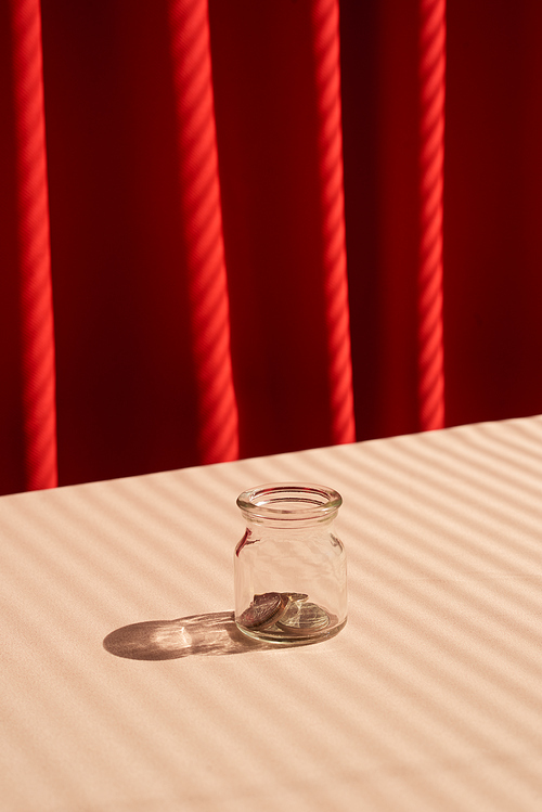 Coins in glass jar. Money savings concept