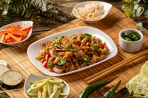 Healthy homemade fried rice with chicken stripes and vegetables