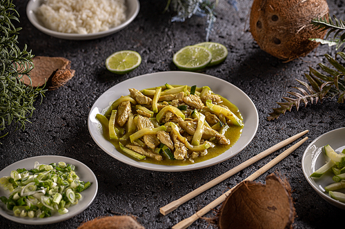 Chicken and zucchini in cocos milk gravy, Asian style food