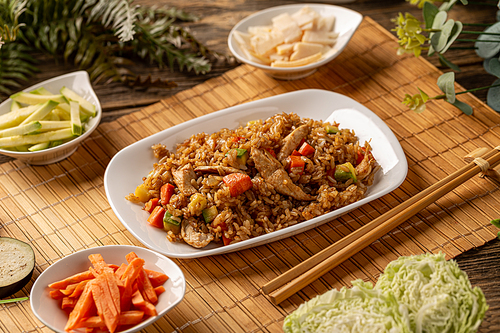 Traditional Chinese food menu, chicken stripes with vegetables served with rice