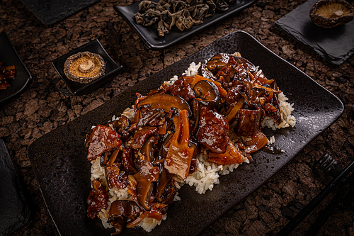 Beef chop suey served with white rice, traditional Chinese food