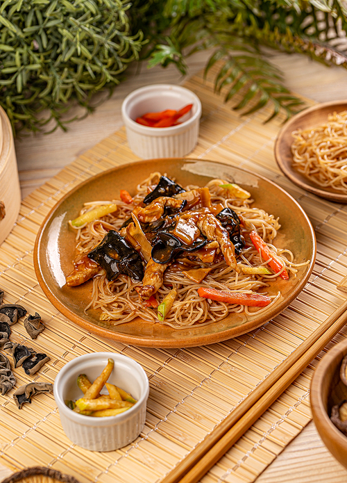 Chow mein menu, stir-fried noodles with vegetables, chicken stripes and jelly ear