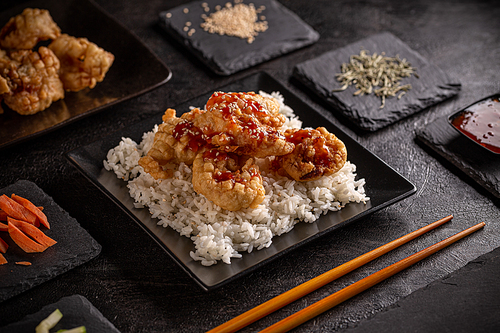 Prawns in tempura batter with sweet chilli sauce served with rice