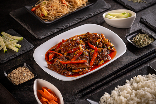 Boiled pork tongue with mixed vegetables in gravy