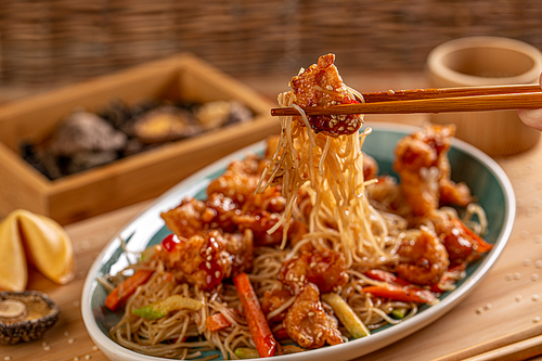 Fried noodles with chicken and vegetables, asian meals