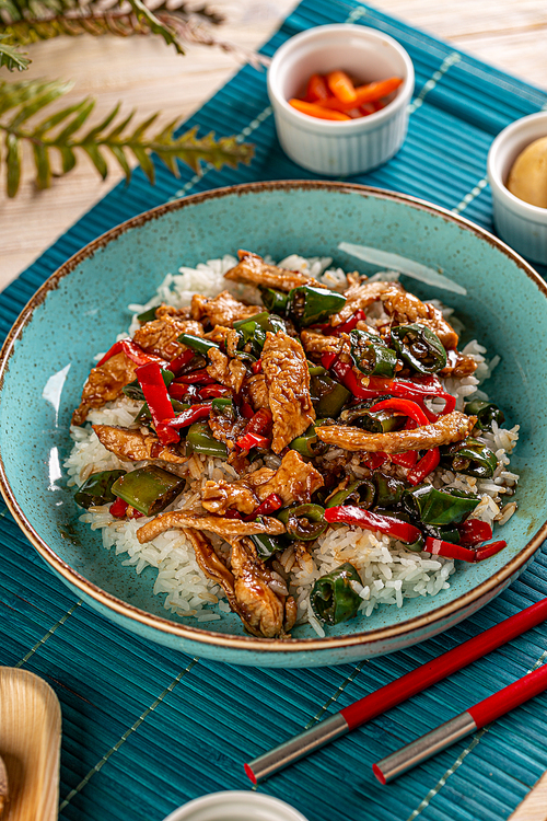 Chinese style chicken with rice, chili and jalapeno pepper