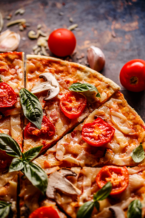 Delicious Italian pizza with cherry tomatoes and mushrooms
