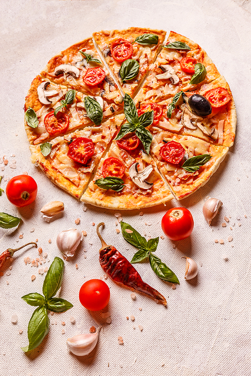 Fresh homemede pizza with tomatoes, cheese and mushrooms