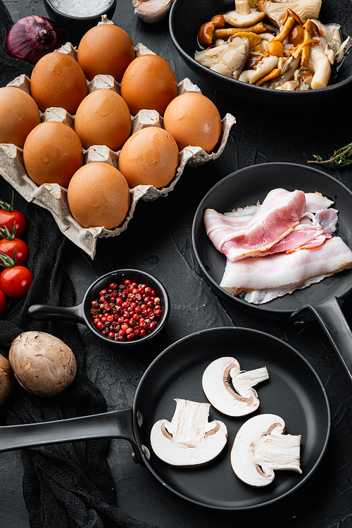 Healthy breakfast ingredients for fried eggs set, on black background