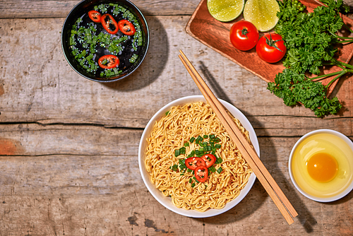 instant noodle in bowl cooked spicy taste topping with eggs