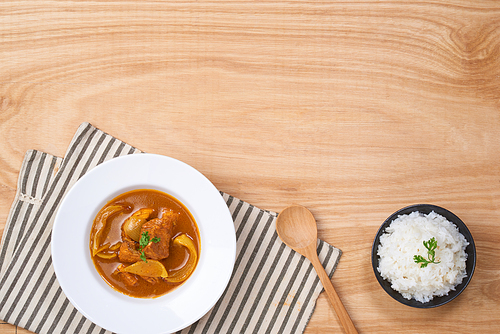 curry chicken with sauce and rice