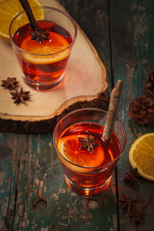 Christmas mulled wine on a rustic wooden table. Holidays concept.