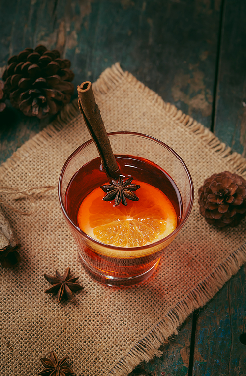 Christmas mulled wine on a rustic wooden table. Holidays concept.