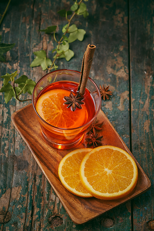 Christmas mulled wine on a rustic wooden table. Holidays concept.