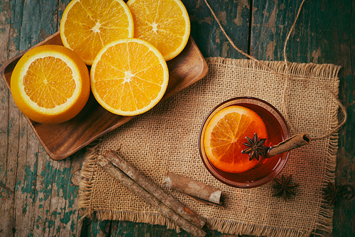 Christmas mulled wine on a rustic wooden table. Holidays concept.