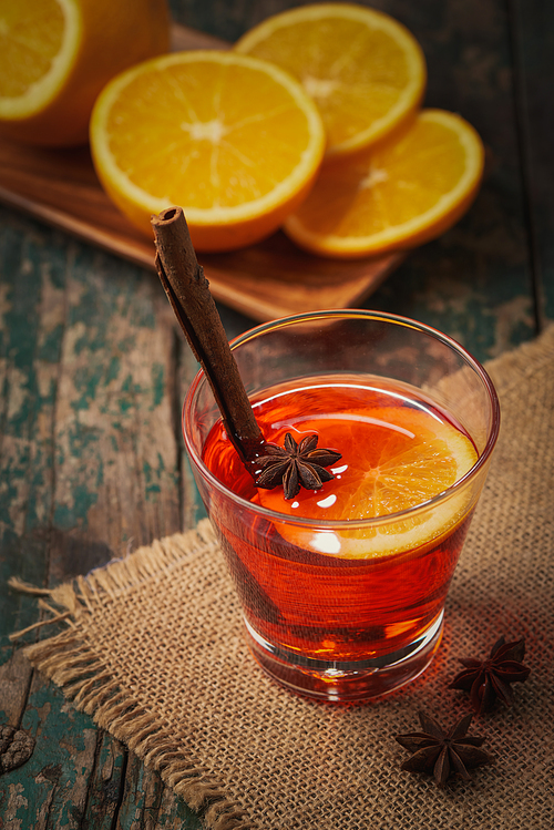 Christmas mulled wine on a rustic wooden table. Holidays concept.