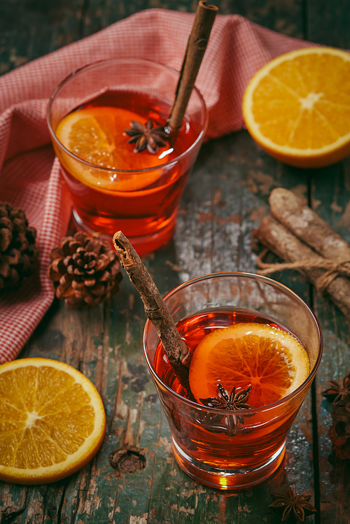 Christmas mulled wine on a rustic wooden table. Holidays concept.