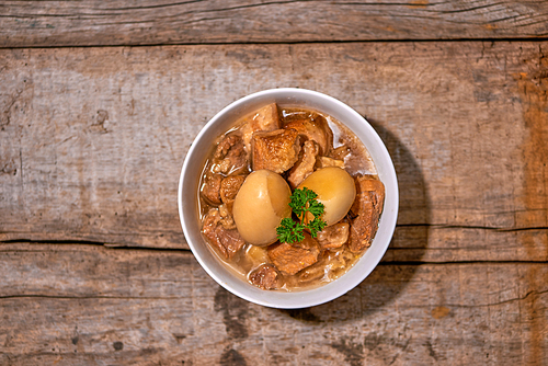 Braised three layer pork with seasoned boiled egg.