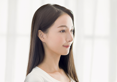 side view of beautiful young asian woman face with clean  healthy skin