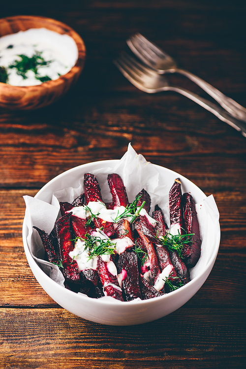 Oven baked beet fries with greek yogurt and dill dressing