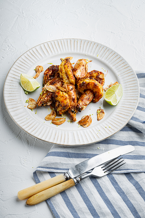 Large grilled BBQ shrimp with sweet Mango sauce and curry set, on plate, on white background
