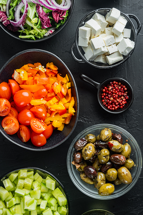 Ingredients, for greek salad, on black background, top view flat lay