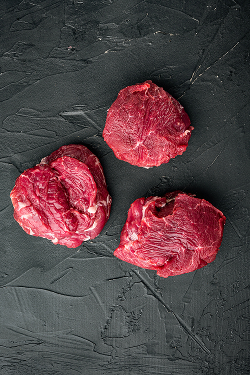 Eye Fillet beef marbled fresh meat steak set, on black stone background, top view flat lay, with copy space for text