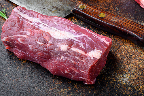 Gourmet portion of raw fresh marbled beef fillet set, on old dark rustic background