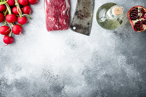 Tenderloin fillet mignon whole cut set, on gray stone background, top view flat lay, with copy space for text