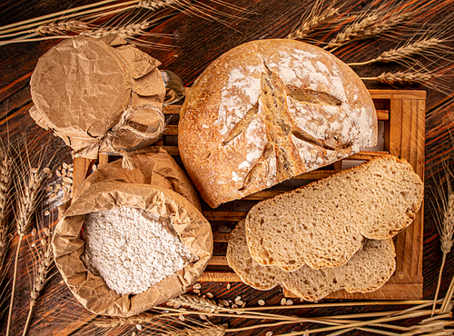 Crusty homemade artisan round wheat sourdough bread loaf