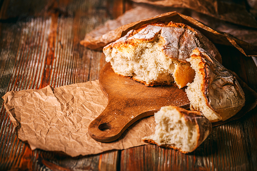 Crusty cereal bread in a rustic composition