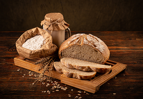 Rustic loaf of bread with active wheat sourdough