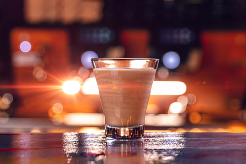 Latte coffee glass on bar counter