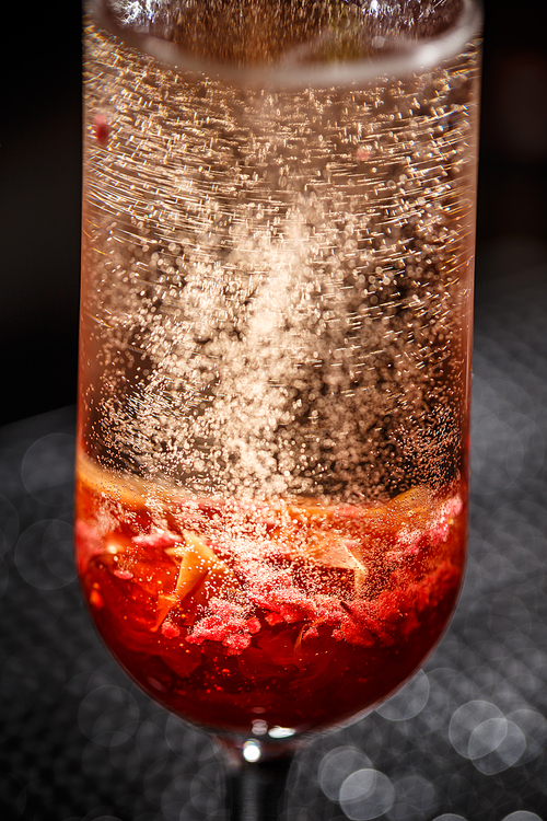 Close up of champagne flute with golden bubbles