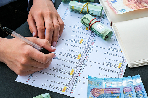 Working businesswoman hand at office workplace desk. Counting money for salary. Investment savings. Finances, economy and home concept. Business budget of wealth and prosperity finance. Workspace office