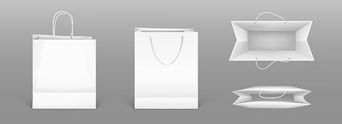 White paper shopping bags front and top view. Vector realistic mockup of blank packet with handles isolated on gray . Template for corporate design on cardboard bag for store or market