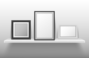 empty photo s standing on white shelf. vector realistic mockup of interior decoration with blank pictures with white and black border. bookshelf with image frames for home, gallery or portfolio