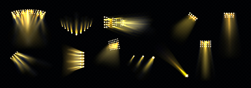 Stage spotlights with shine gold beams isolated on black background. Vector realistic set of stadium projectors with yellow light rays. Illumination equipment for concert, show or party